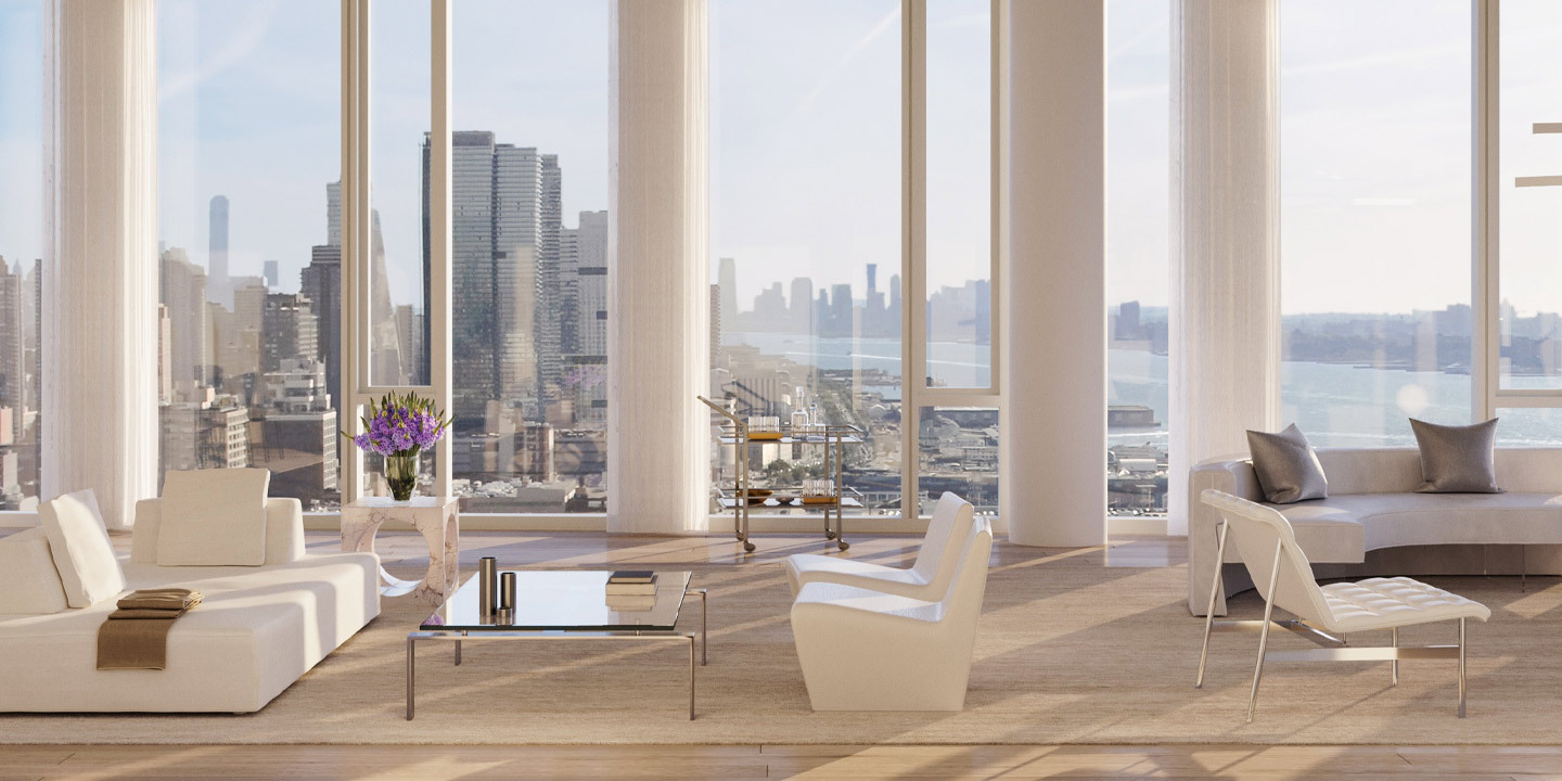 A modern living room with floor-to-ceiling glass walls, allowing natural light to fill the space, featuring a sleek sofa set and contemporary furnishings for a stylish, open feel.