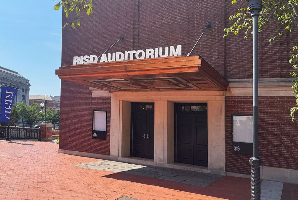 RISD Auditorium entrance with custom architectural signage and fabrication details.