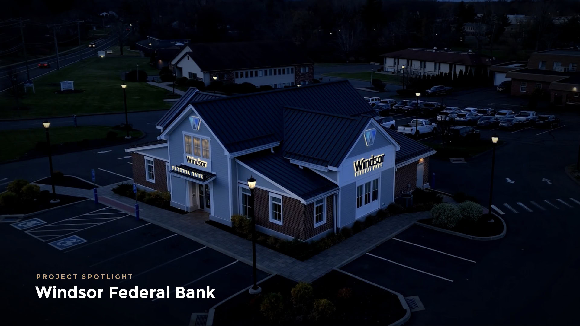 Windsor Federal Bank at dusk with illuminated signage fabricated by ARTfx