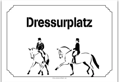 a sign with two people riding horses