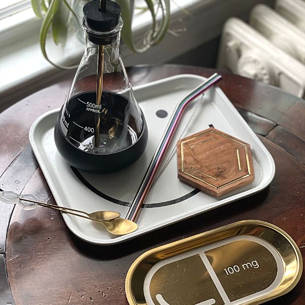 This image shows various science gifts for teachers on a wooden table