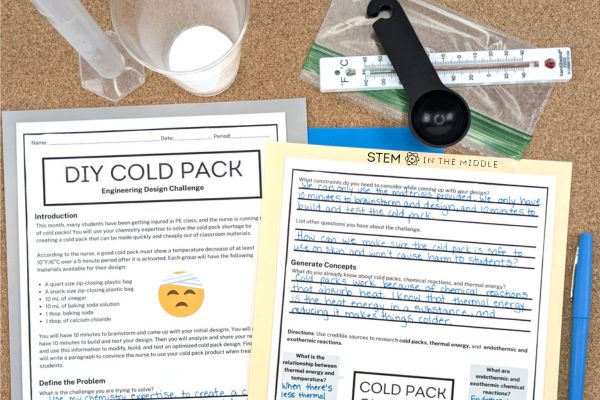 This image shows two worksheets titled "DIY Cold Pack: Engineering Design Challenge." The worksheets have been filled in with blue ink. There is a graduated cylinder, baking soda, a thermometer, a resealable plastic bag, and a measuring spoon in the background.