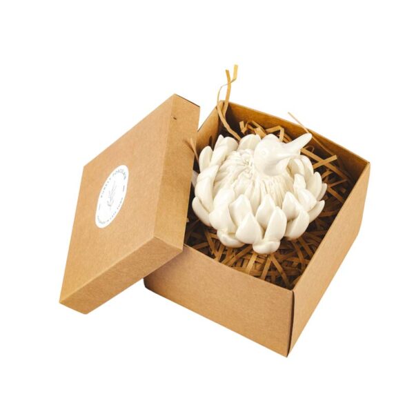 arge glazed porcelain protea flower with detailed sunbird sculpture, handmade in Cape Town