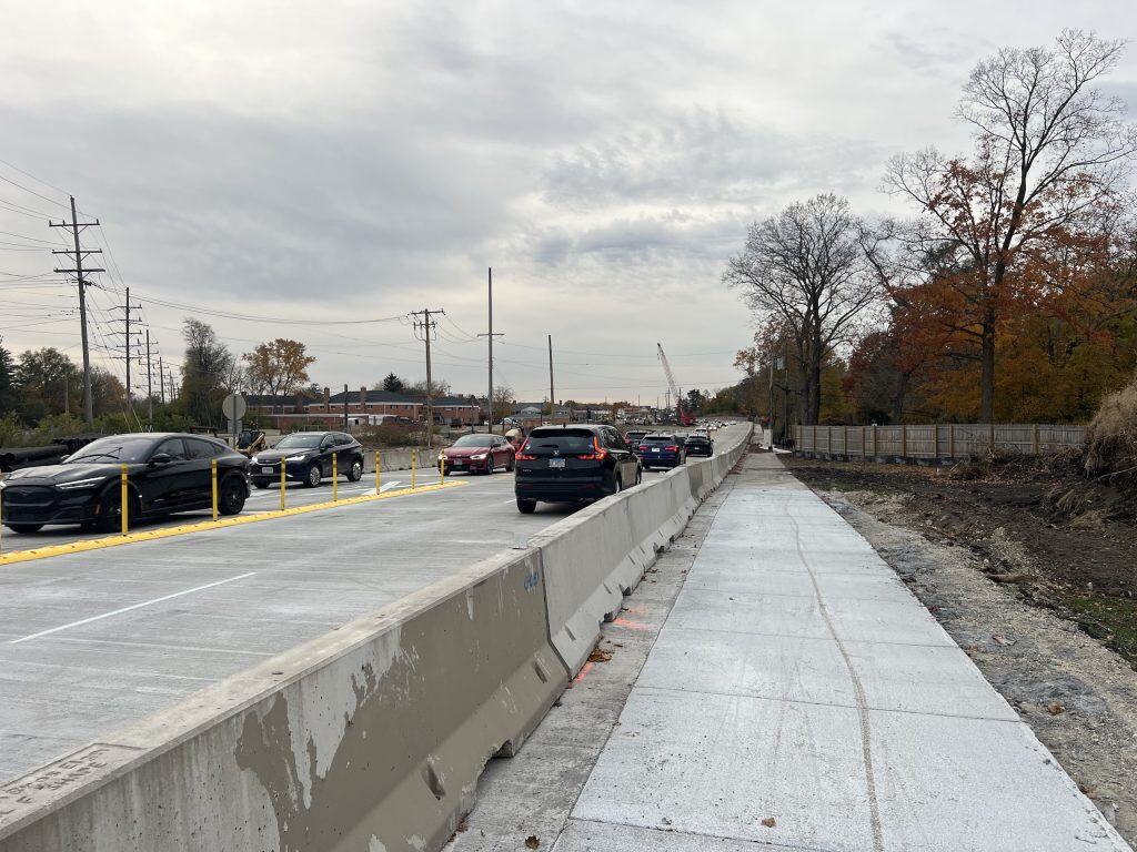 Newly constructed suburban bike lane along busy road in Chicago suburbs.