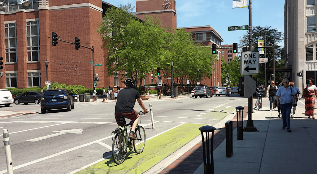 Cyclist riding on a designated bike lane in Evanston, Illinois.