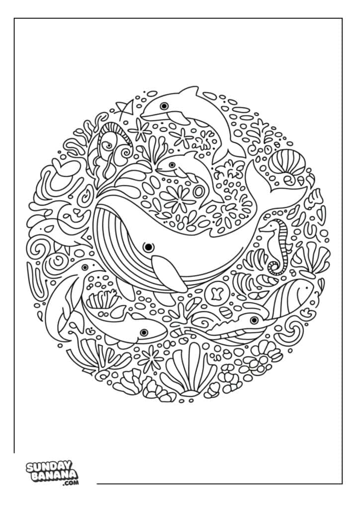 A coloring page A circular underwater scene with a large smiling whale in the center, surrounded by fish, dolphins, seaweed, coral, shells, and bubbles. The illustration is outlined in black and white, suitable for coloring. SundayBanana.com is printed in the bottom left corner.