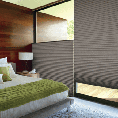 Custom exterior sun shades on large window for modern home.