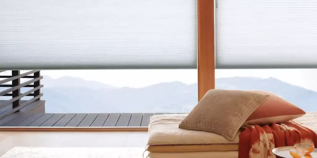 Roller sun shades window fashions for patio and living room sunlight control.