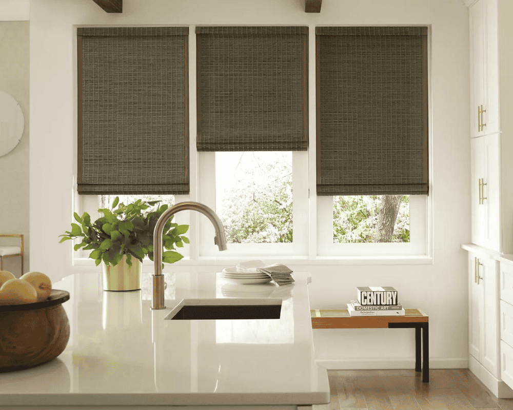 Black woven wood sun shades for window fashion and UV protection.