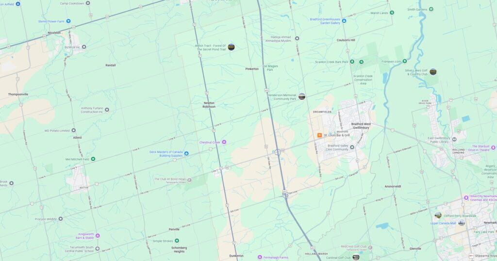 Wide view of Hwy 400 corridor with key landmarks and parks in the Gwillimbury area, including Scanlon Creek Beach, Bradfield, and surrounding communities. Perfect for local navigation and geographic reference.