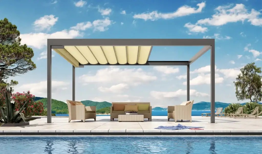 Contemporary outdoor patio with a sleek shade structure, comfortable seating, and scenic water view, perfect for relaxing or entertaining.