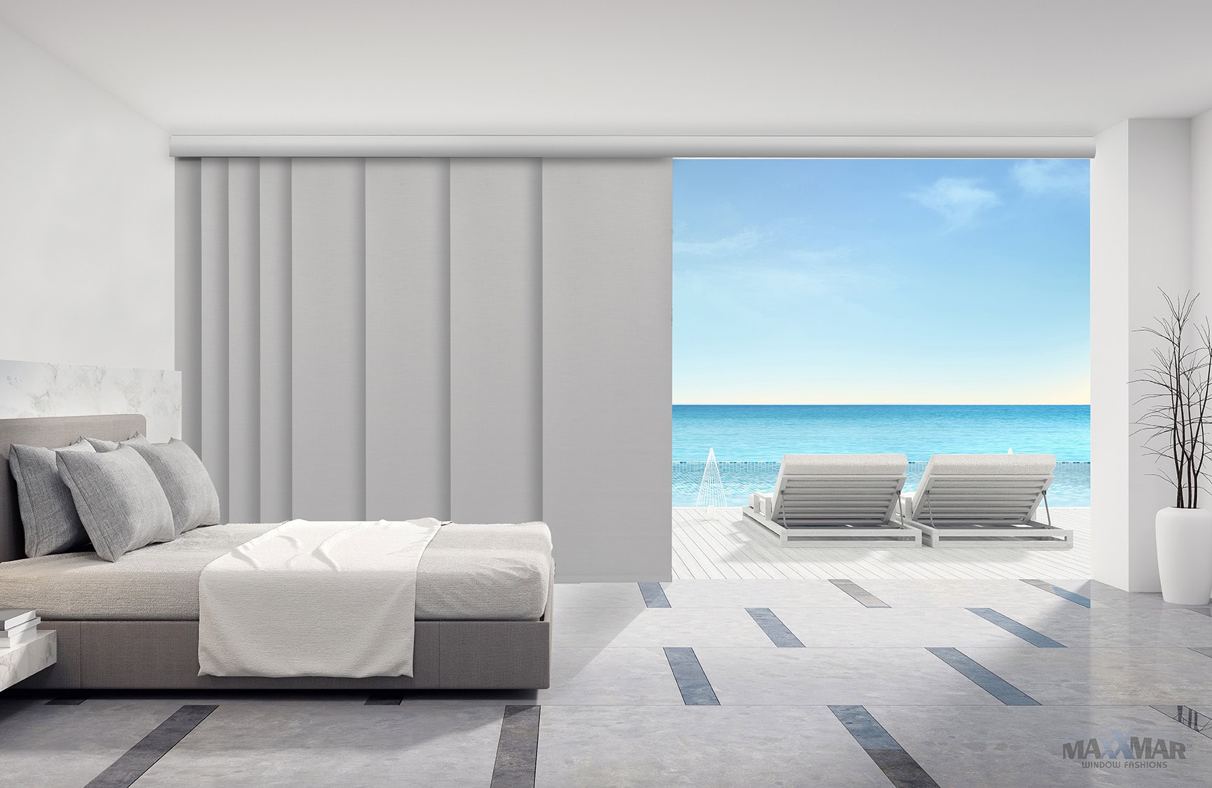 Bright, modern bedroom with large glass sliding door opening to a beach view, two lounge chairs on the sand, and a minimalist interior with neutral tones.