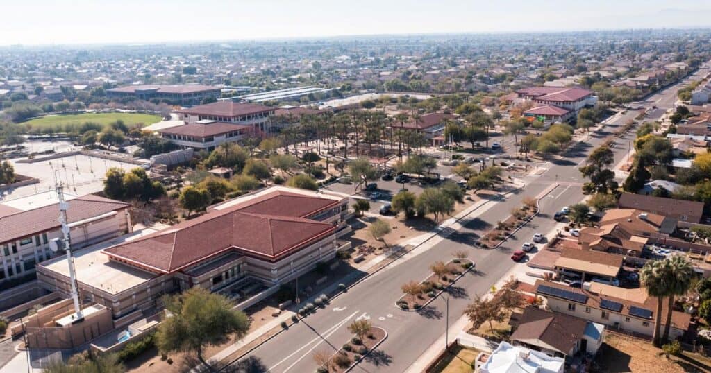 Window blinds installation in suburban neighborhood, Superior Blinds, custom window treatments, sun shading solutions, modern window coverings, residential blinds, outdoor shading options, blind repair and replacement, energy-efficient window blinds, professional blind services.