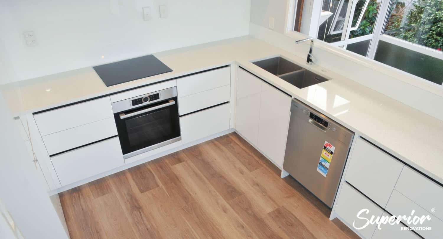 Renovation Cost Per Square Metre NZ (2026 Breakdown) - Superior Renovations 29 Renovated white kitchen from a full house renovation in Milford, North Shore