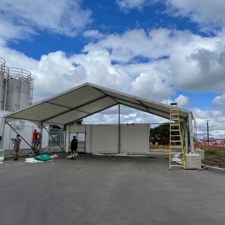 Large event tent setup for weddings and parties by Superior Tent Rentals.