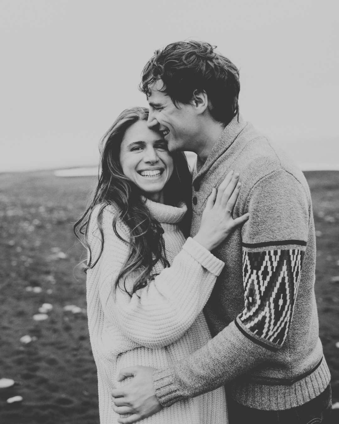 Sensual moment between a couple, illustrating the deepened physical and emotional connection supported by intimacy coaching.