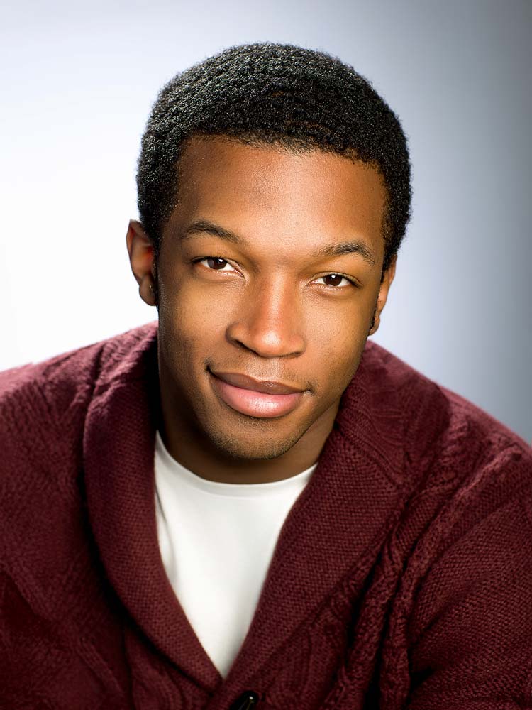 Sussex headshots for actors. Bright professional headshot of a young man with confident expression, showcasing Sussex Headshots' expert portrait photography services.
