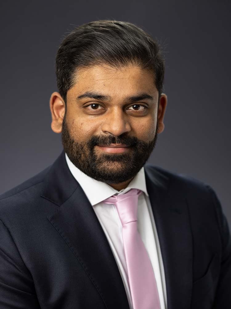 Professional Sussex headshot of a confident businessman in formal attire, ideal for corporate profiles and LinkedIn, showcasing quality Sussex headshots services.