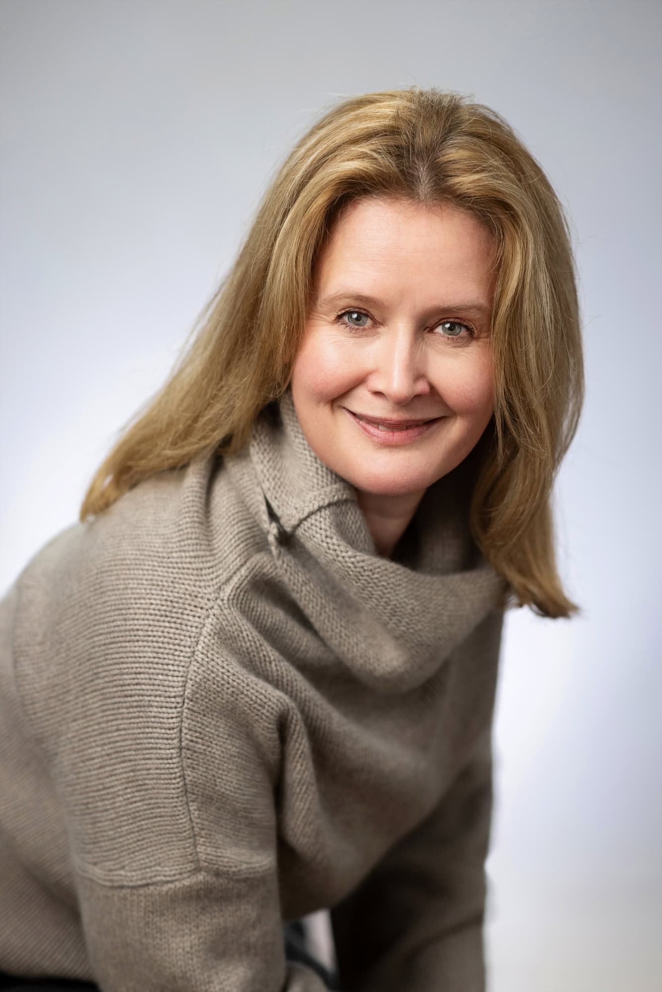 AI headshots vs real professional headshots taken by a real photography studio