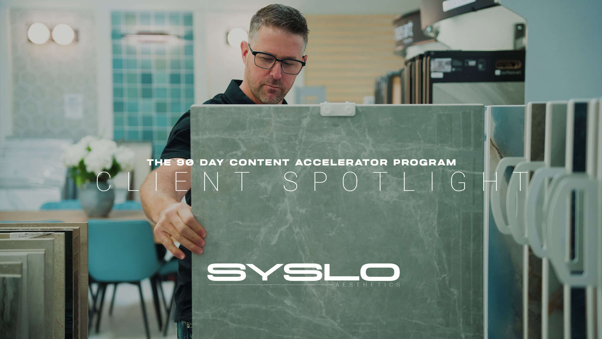 Beautiful man examining green marble tile at a showroom, showcasing premium stone surfaces for interior design and renovation projects.