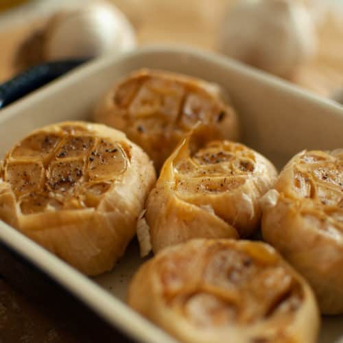 Whole Roasted Garlic in a Dish