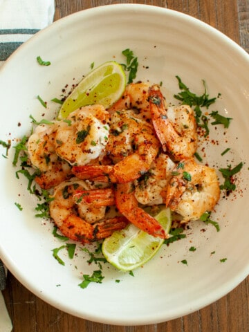 Cilantro Lime Shrimp in a bowl with cilantro garnish