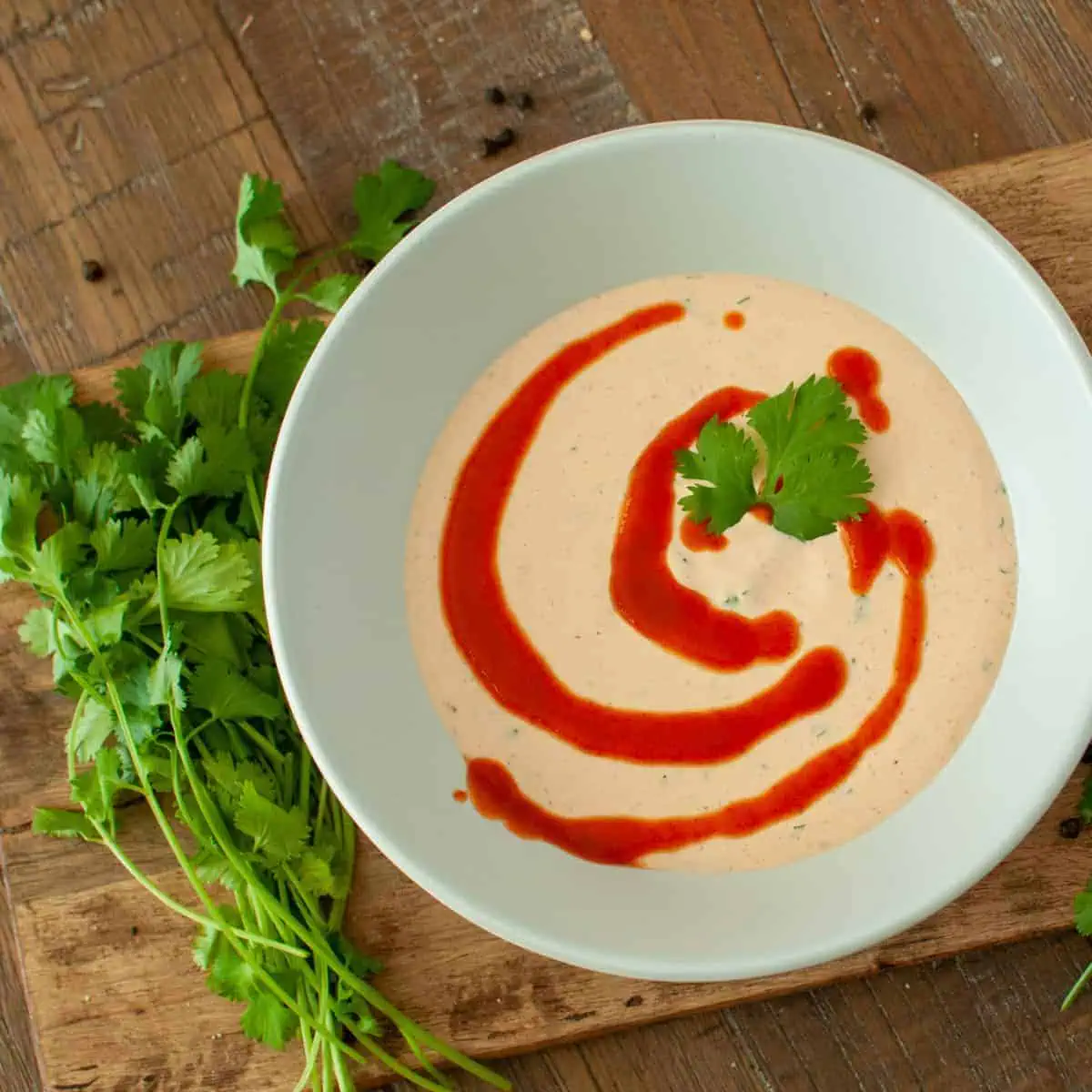 Sriracha Aioli with a drizzle of sriracha on top
