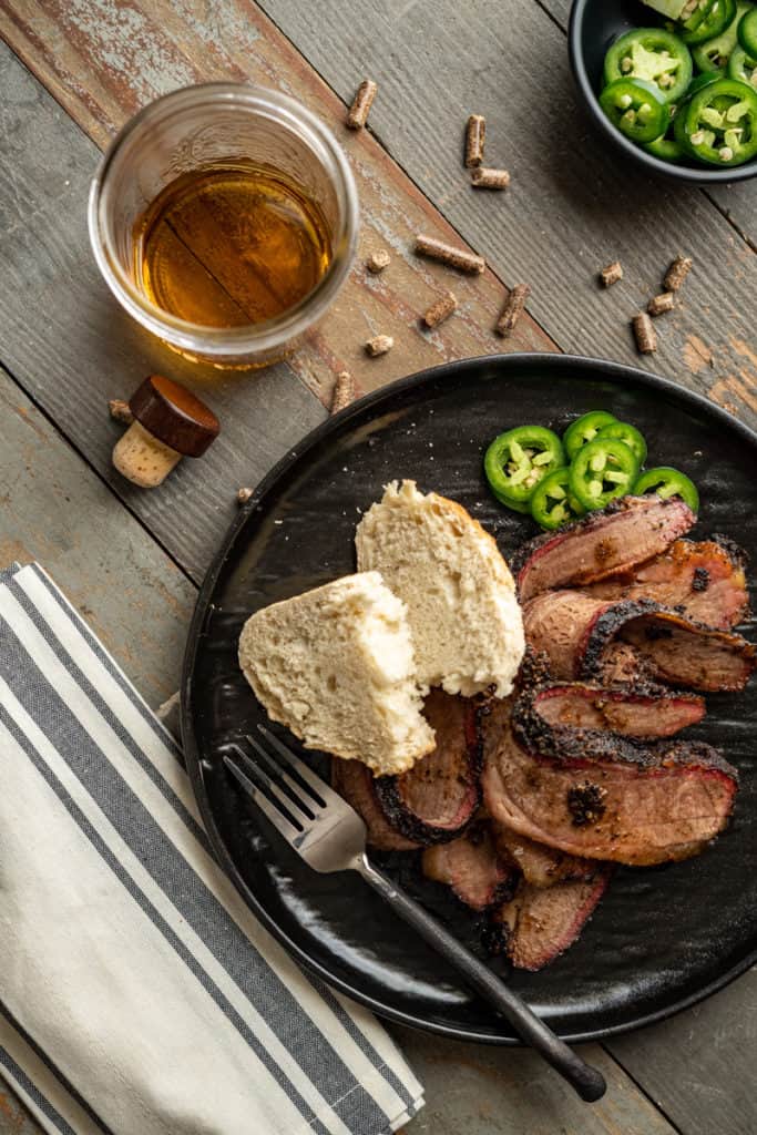 Smoked Brisket Plated with Bread & Jalapenos