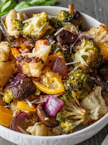 Smoked Vegetables in owl with a serving spoon