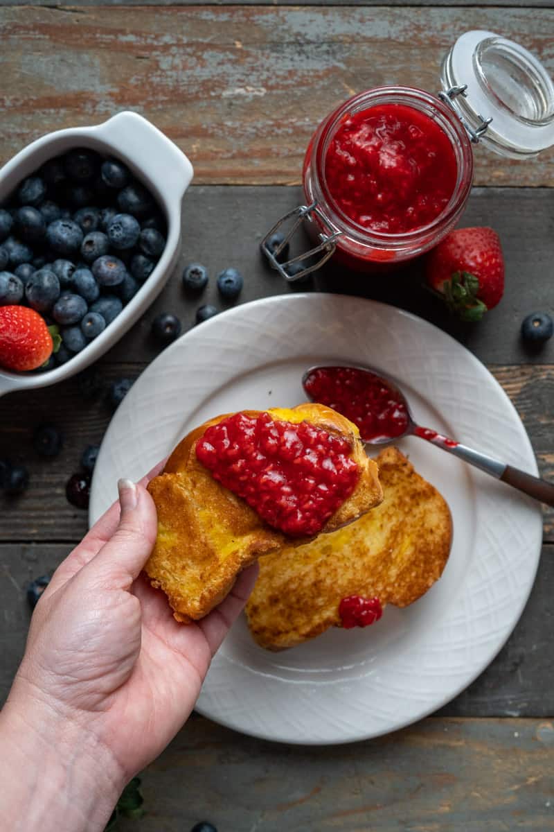 Raspberry compote spread on brioche toast