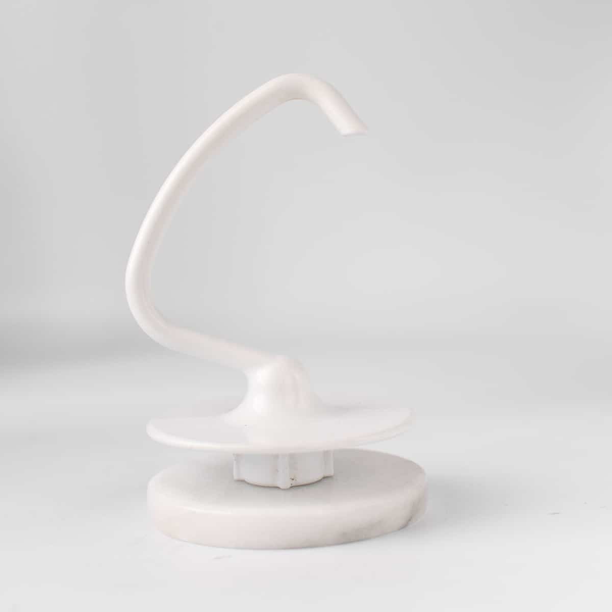 KitchenAid dough hook on a white background