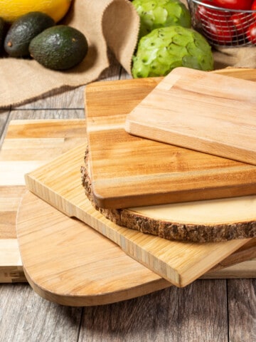 mixed stack of charcuterie and cutting boards