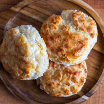 3 biscuits on a wooden tray