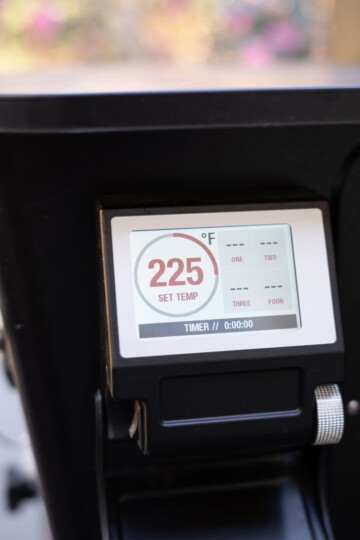 temperature screen on the smoker set to 225 degrees