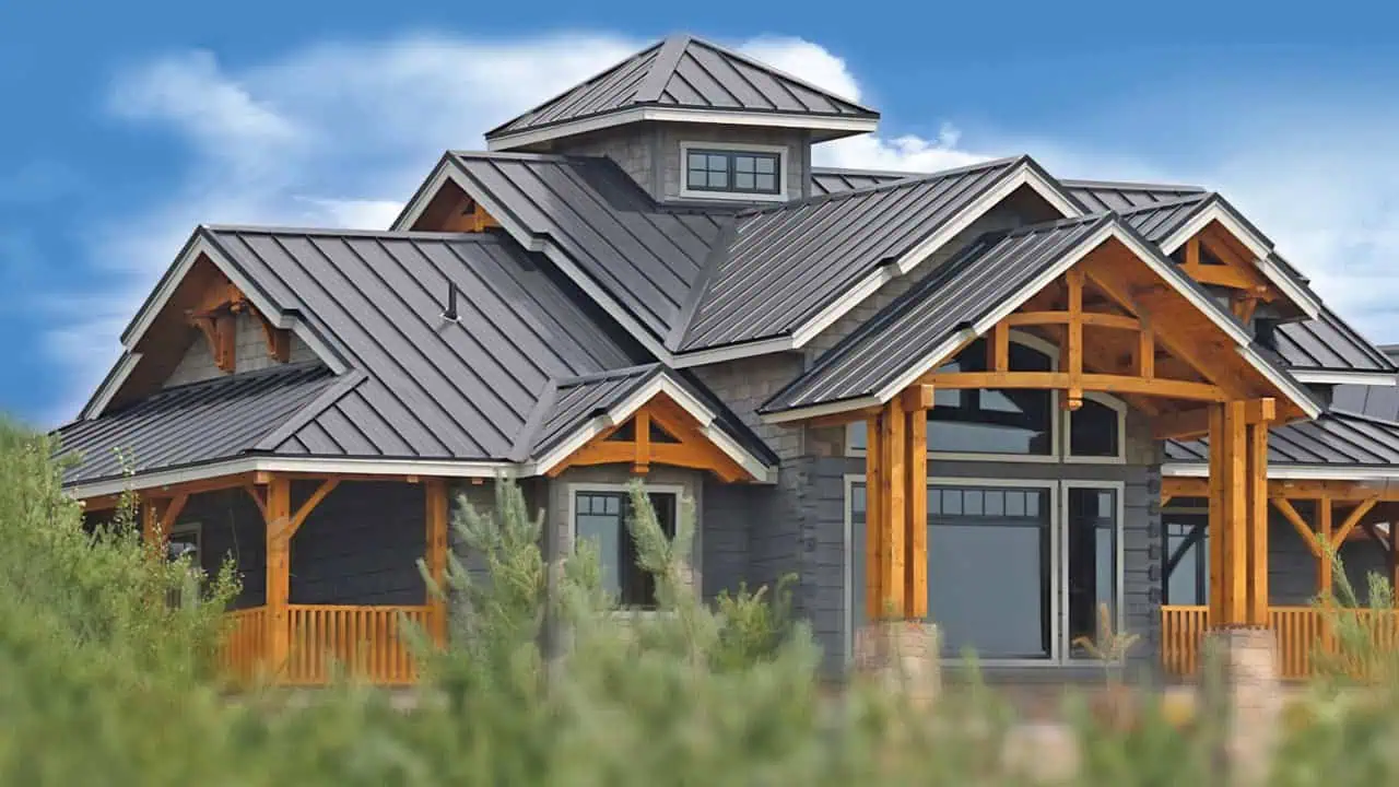 Modern residential building with metal roofing and wooden accents, showcasing durable construction a.