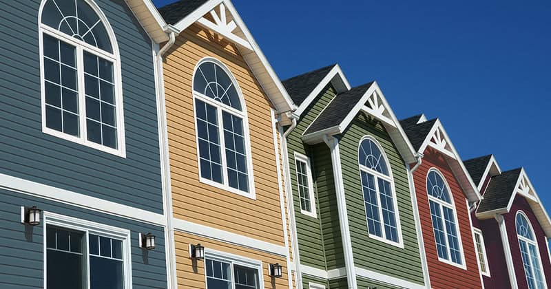 Modern multi-colored house exteriors with durable siding and stylish design.