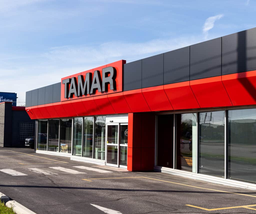 Tamar Building Products storefront with modern black and red exterior design.