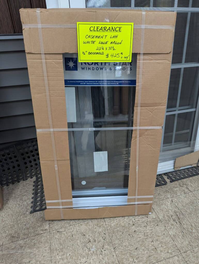 New casement window with white frame, 24x36 inches, for residential installation.