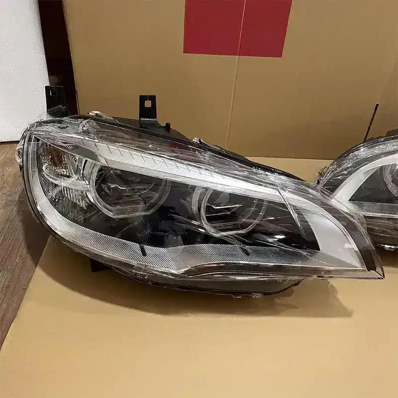 BMW X5 headlight assembly07-13 E70 old model modified new xenon laser lens LED