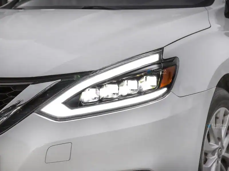 High-quality car headlight assembly with LED daytime running lights for Nissan vehicles.