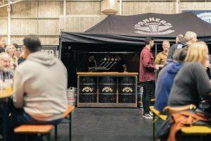 Craft beer tasting at Taranaki Beer Festival with local and craft ales on tap.