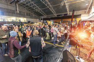 People enjoying live music at Taranaki Beer Festival, craft beer tasting, indoor event in Taranaki New Zealand.