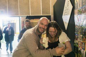 Vibrant crowd enjoying the Taranaki Beer Festival with craft beers and live entertainment.