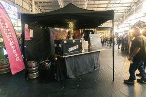 Duncan's beer stand at Taranaki Beer Festival, showcasing local craft beers and brewery stalls.