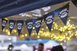 Bright banner for Garage Project at Taranaki Beer Festival in Wellington, showcasing craft beer and local brewing culture.