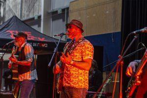 Live band performing at Taranaki Beer Festival, showcasing craft beers and local music in New Zealand.