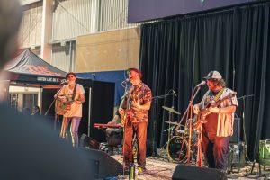 Vibrant live band performing at Taranaki Beer Festival, showcasing local craft beers and entertainment in New Zealand.