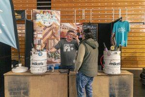 Beer tasting at Taranaki Beer Festival, showcasing local brews and vibrant atmosphere in New Zealand.