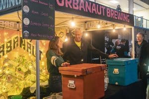 Fresh craft beers at Taranaki Beer Festival with local breweries and vibrant atmosphere in New Zealand.