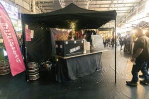 Craft beer stall at Taranaki Beer Festival, showcasing local brews and vibrant craft beer culture in New Zealand.